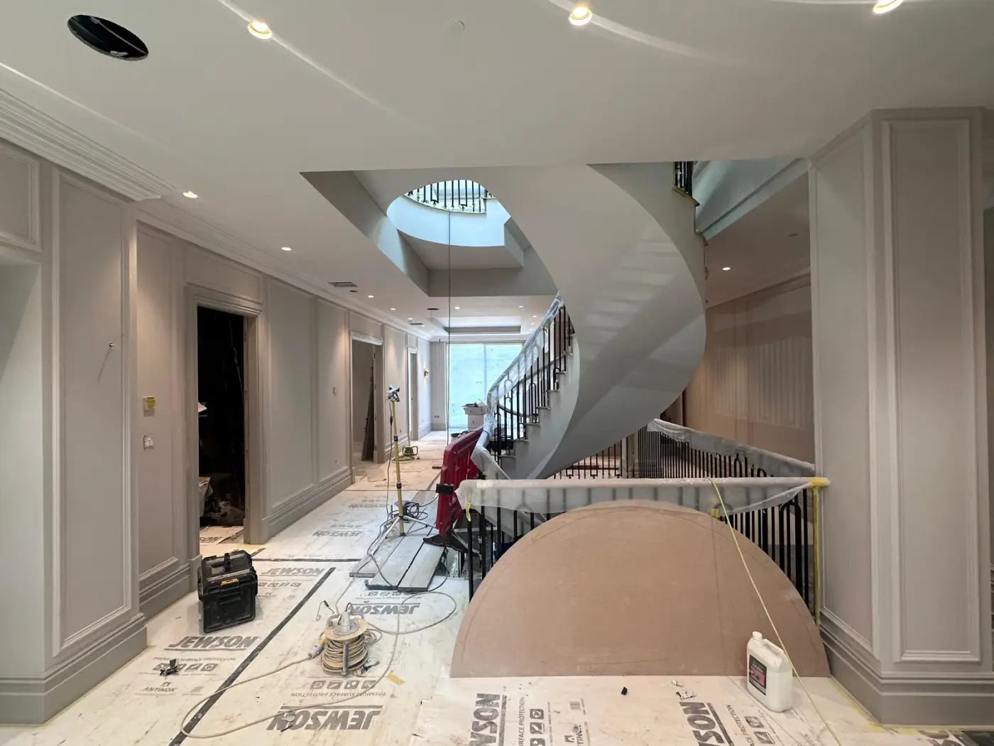 The completed concrete stair, plastered with balustrade and panelled hall