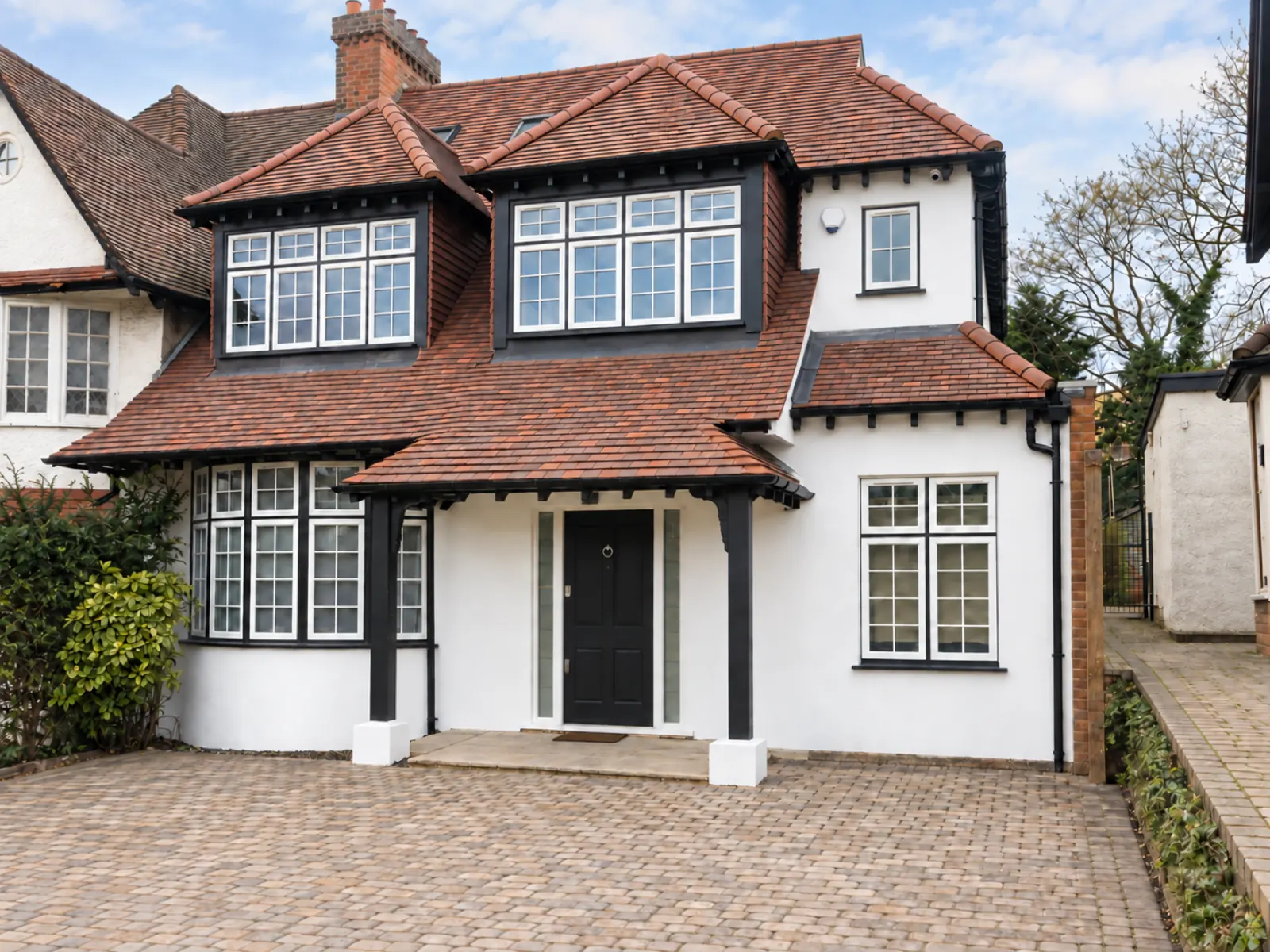 Front elevation of the remodelled house in Golders Green near completion