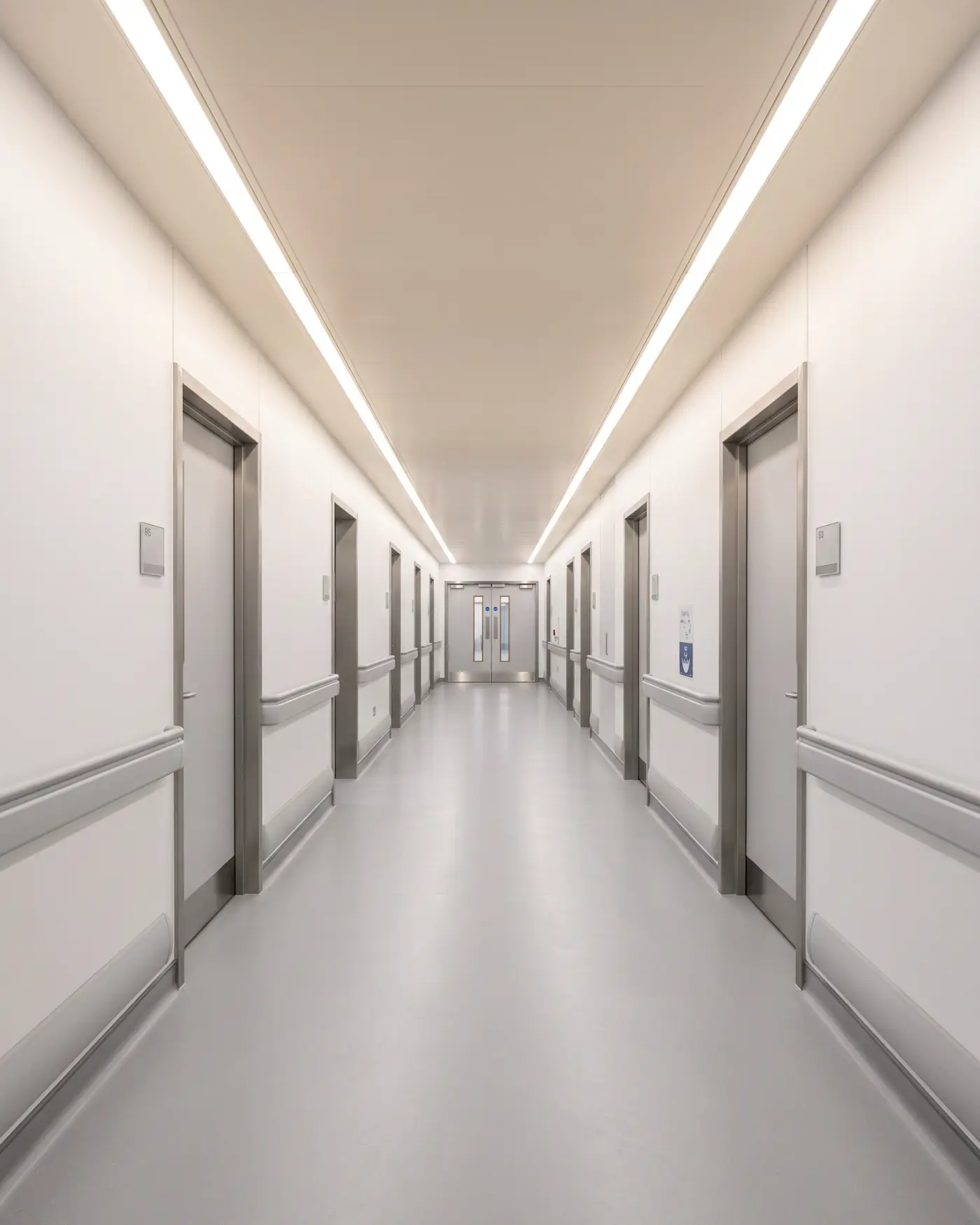 Clinical corridor with hygienic wall protection and welded vinyl flooring